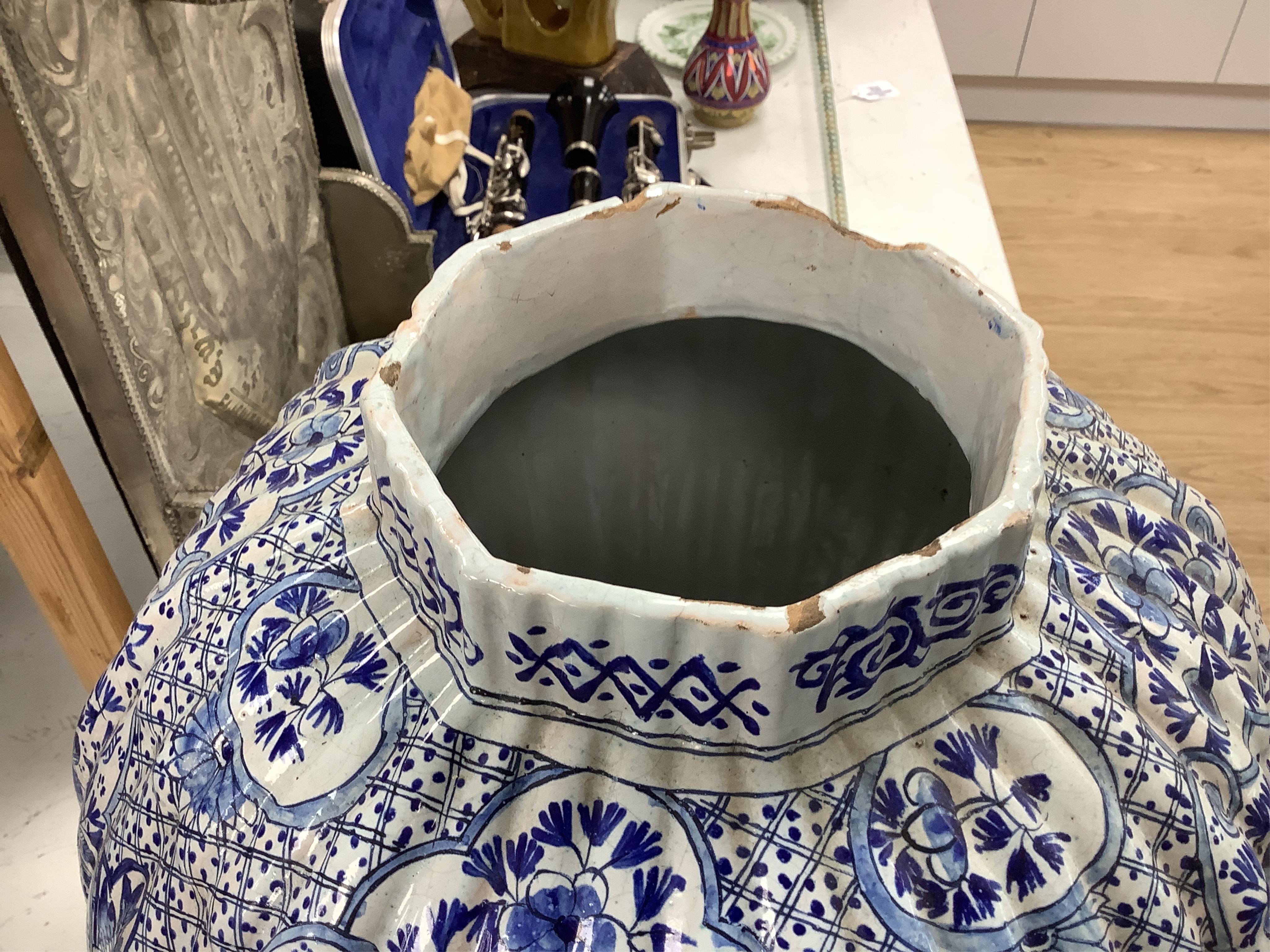 A large Delft blue and white vase and cover, 65cm tall